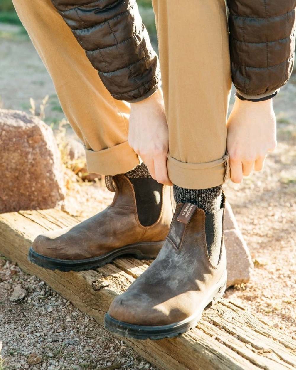 Antique brown coloured Blundstone 1609 Antique Brown Boots on street background 