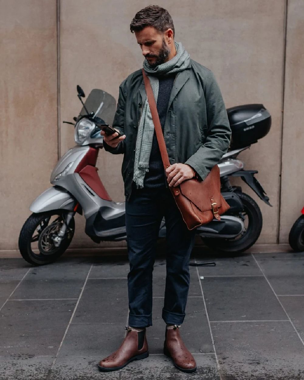 Chestnut Brown coloured Blundstone 1900 Chestnut Brown Dress Boots on  street background