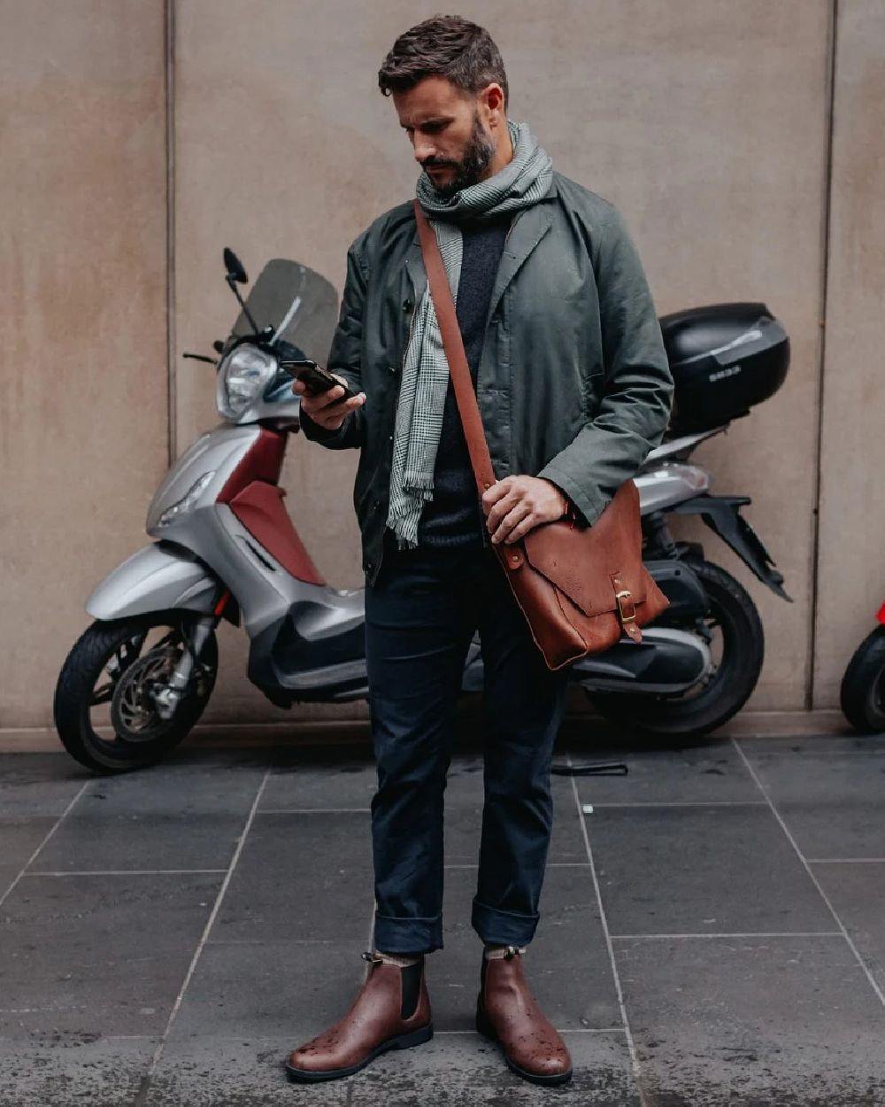 Chestnut Brown coloured Blundstone 1900 Chestnut Brown Dress Boots on  street background 