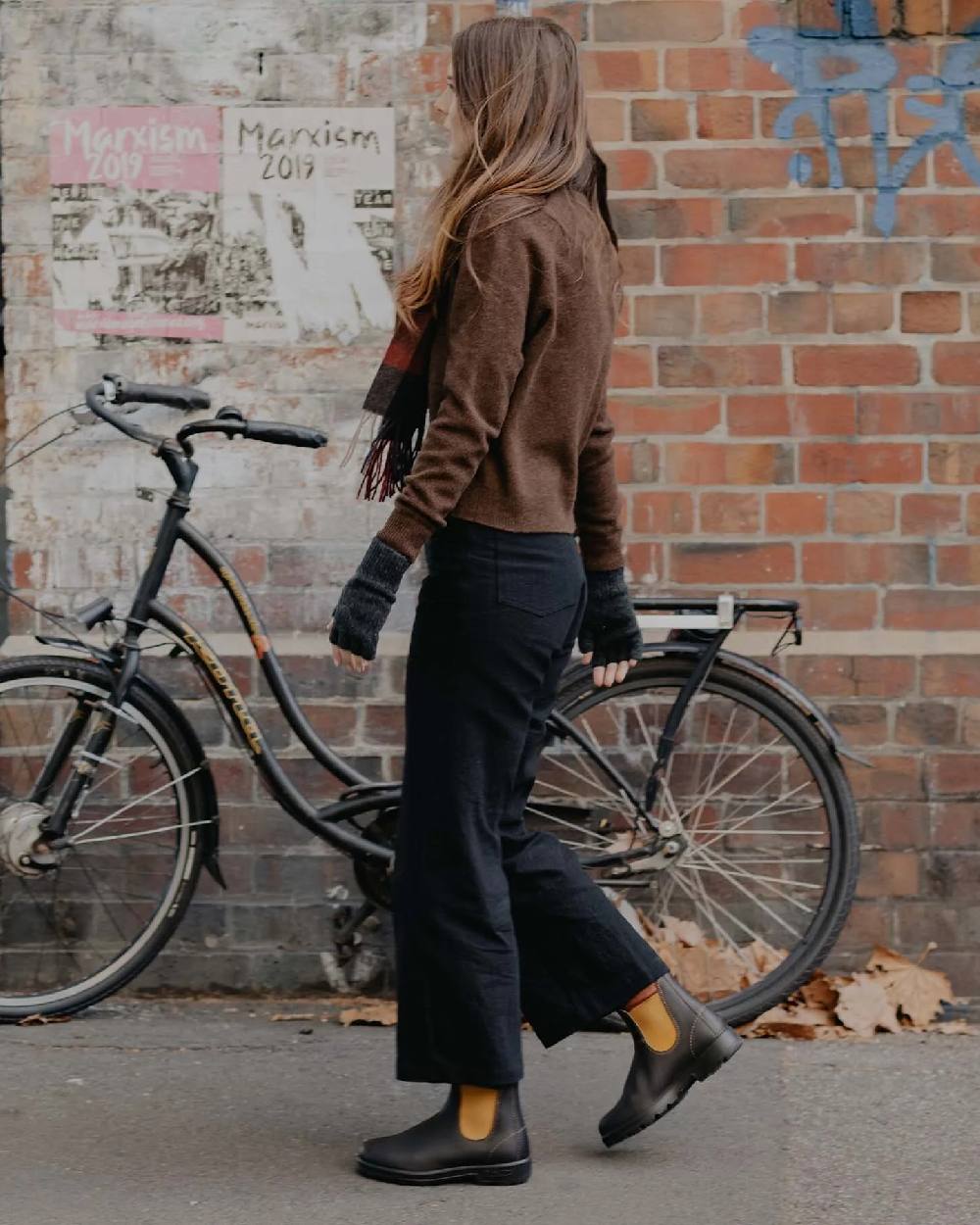 Dark Brown Mustard coloured Blundstone 1919 Dark Brown Mustard Leather Boots on street background 