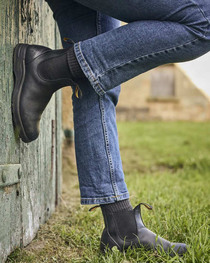 Black Coloured Blundstone 2058 Black Chelsea Boots on outdoor background 