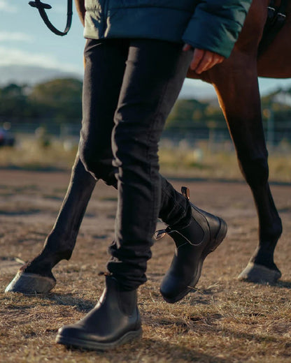 Black Coloured Blundstone 2058 Black Chelsea Boots on outdoor background 