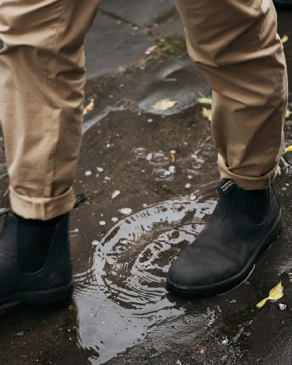 Rustic Black coloured Blundstone 587 Rustic Black Leather Boots on street background 