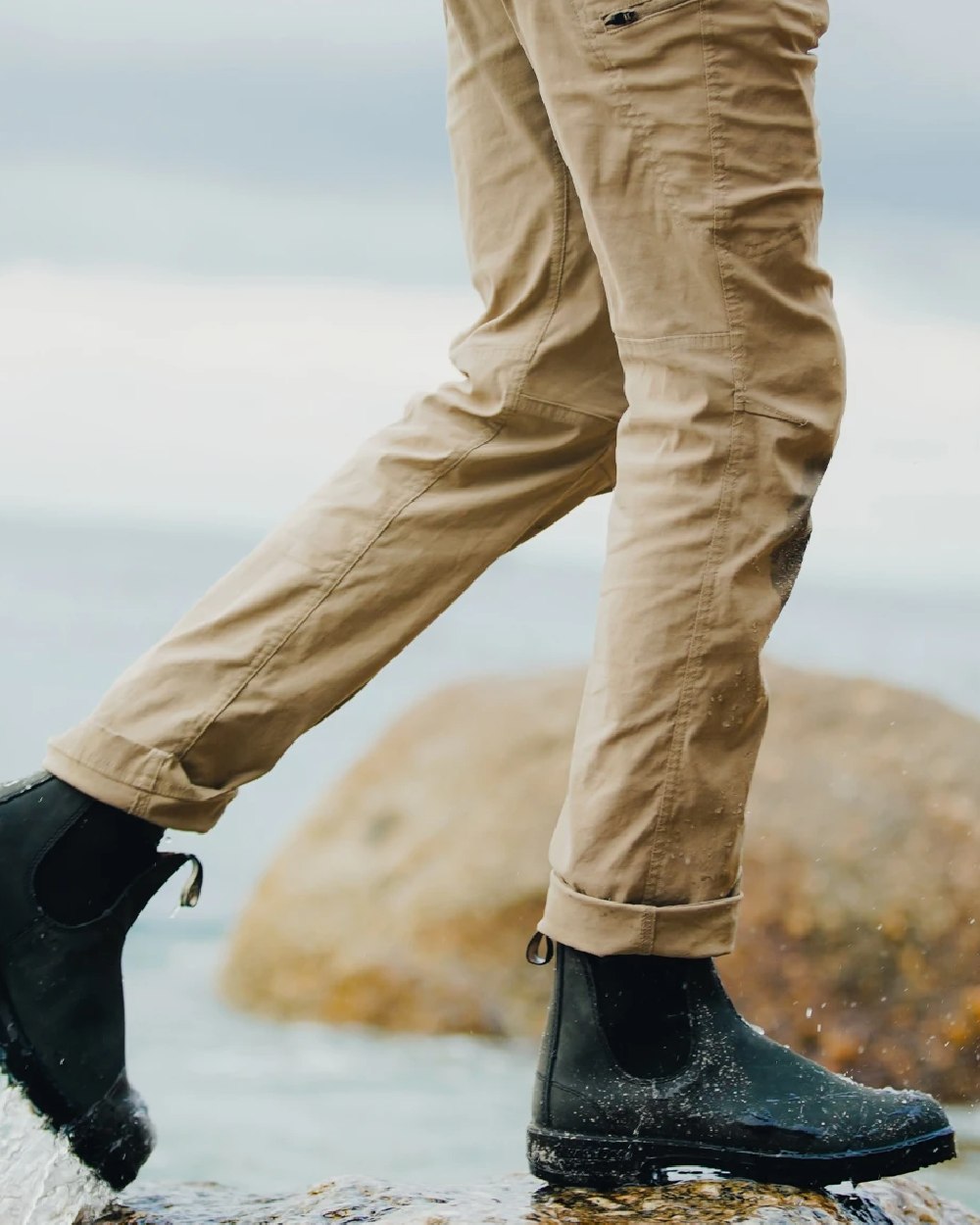 Rustic Black coloured Blundstone 587 Rustic Black Leather Boots on water background 