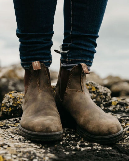 Rustic Brown coloured Blundstone Classic 585 Chelsea Boots on rock background 