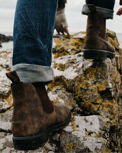 Rustic Brown coloured Blundstone Classic 585 Chelsea Boots on rock background 