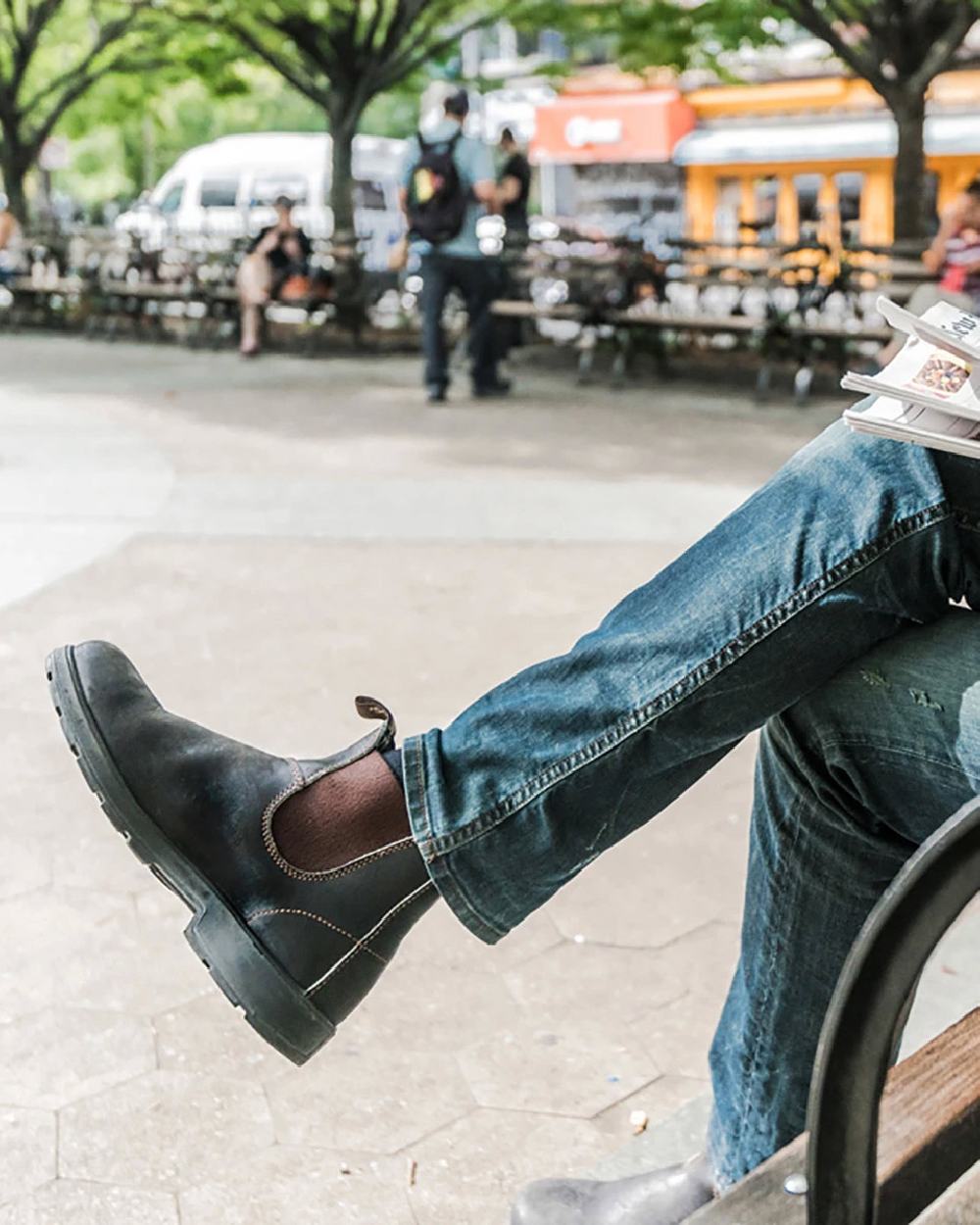 Stout Brown coloured Blundstone Original 500 Chelsea Boots on street background 