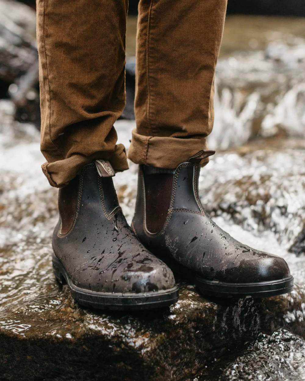 Stout Brown coloured Blundstone Original 500 Chelsea Boots on waterfall background 