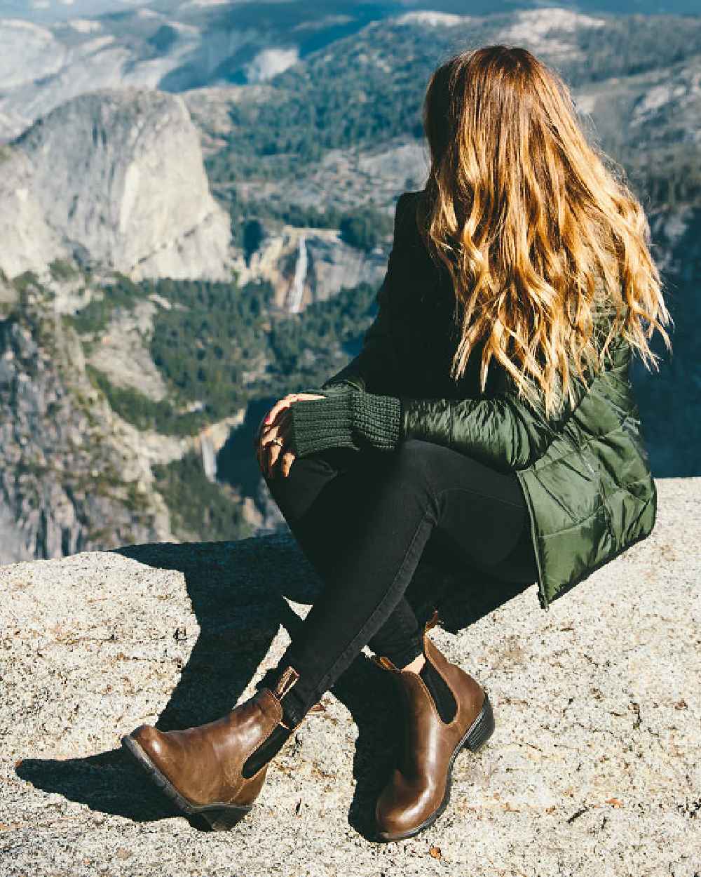 Antique Brown coloured Blundstone Womens 1673 Chelsea Boots on mountain background 