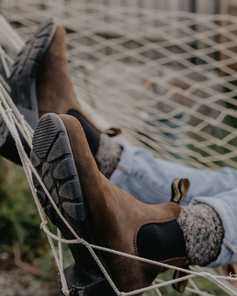 Antique Brown coloured Blundstone Womens 1673 Chelsea Boots on hammock background 