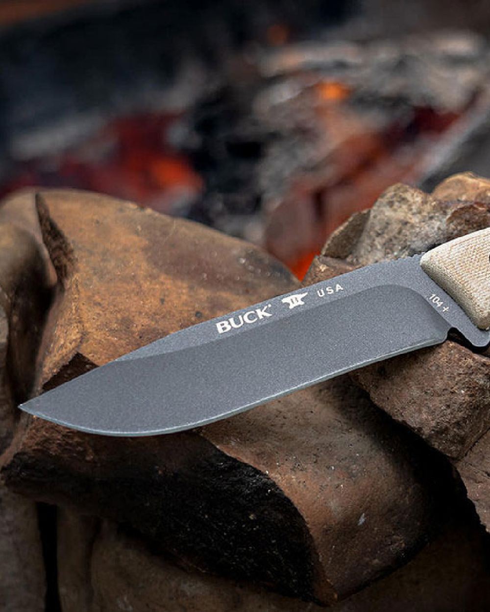 Buck Compadre Camp Knife on rock background