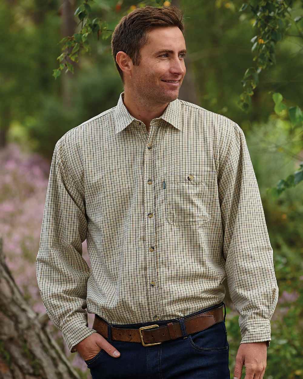 Green Olive coloured Champion Cartmel Micro Fleece Lined Tattersall Shirt on forest background 