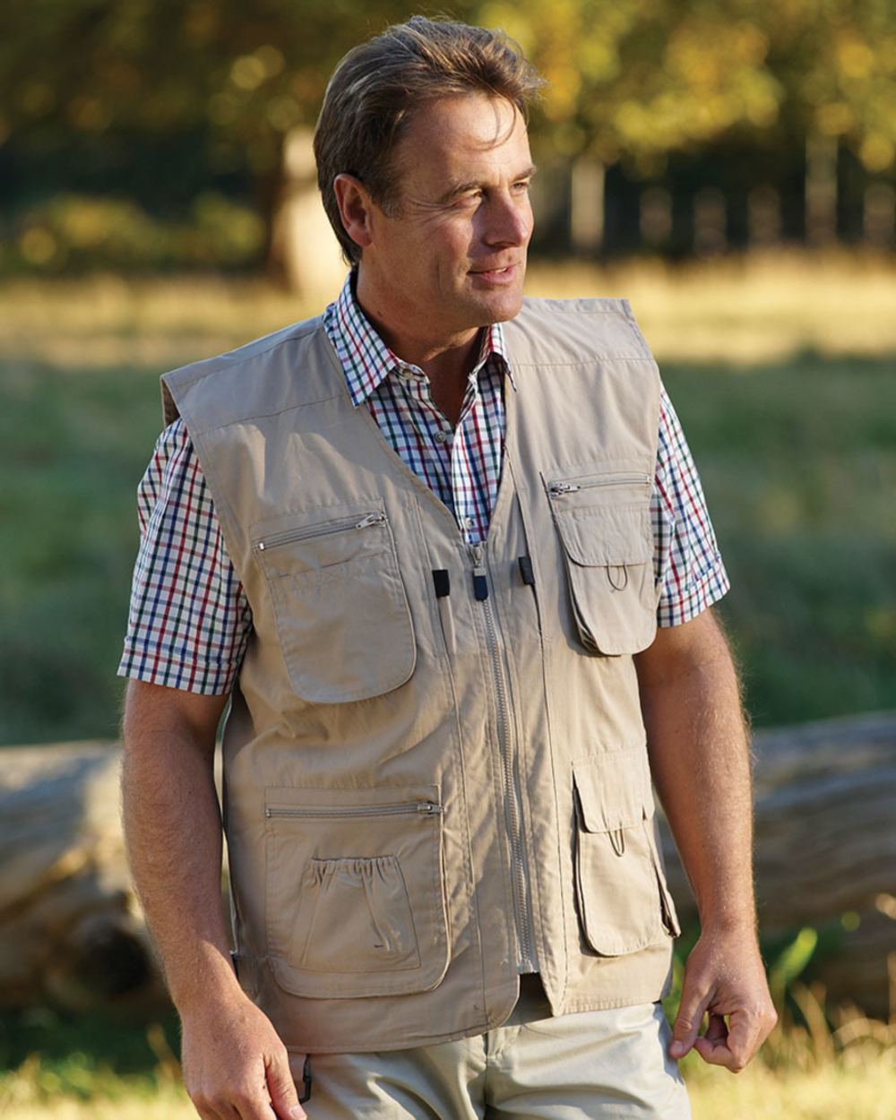 Stone coloured Champion Dale Gilet on blurry park background 