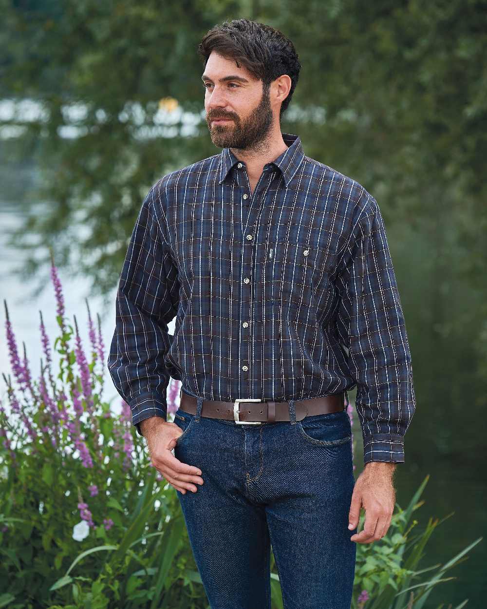 Blue coloured Champion Sherborne Fleece Lined Shirt on pond background 