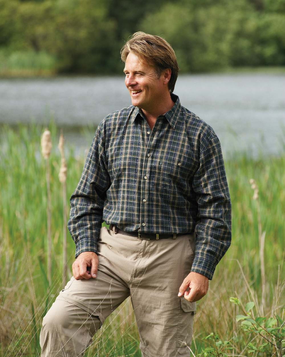 Olive coloured Champion Sherborne Fleece Lined Shirt on river background 