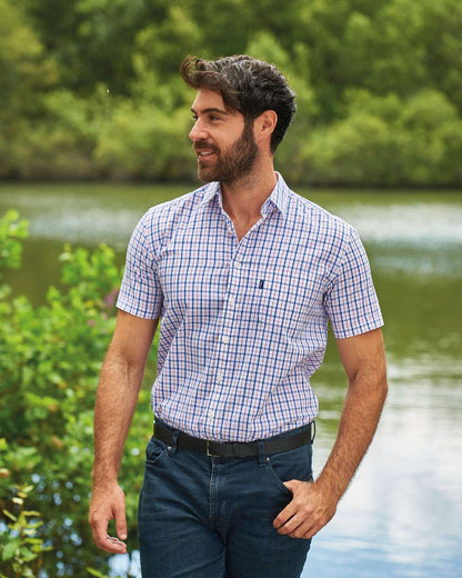 Red coloured Champion Whitstable Short Sleeve Shirt on pond background 