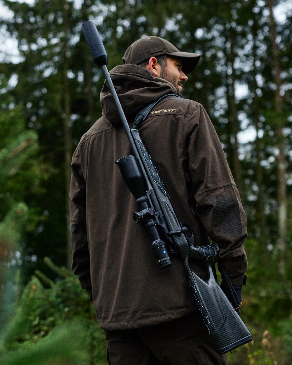 Wood coloured Deerhunter Game Cap on forest background 