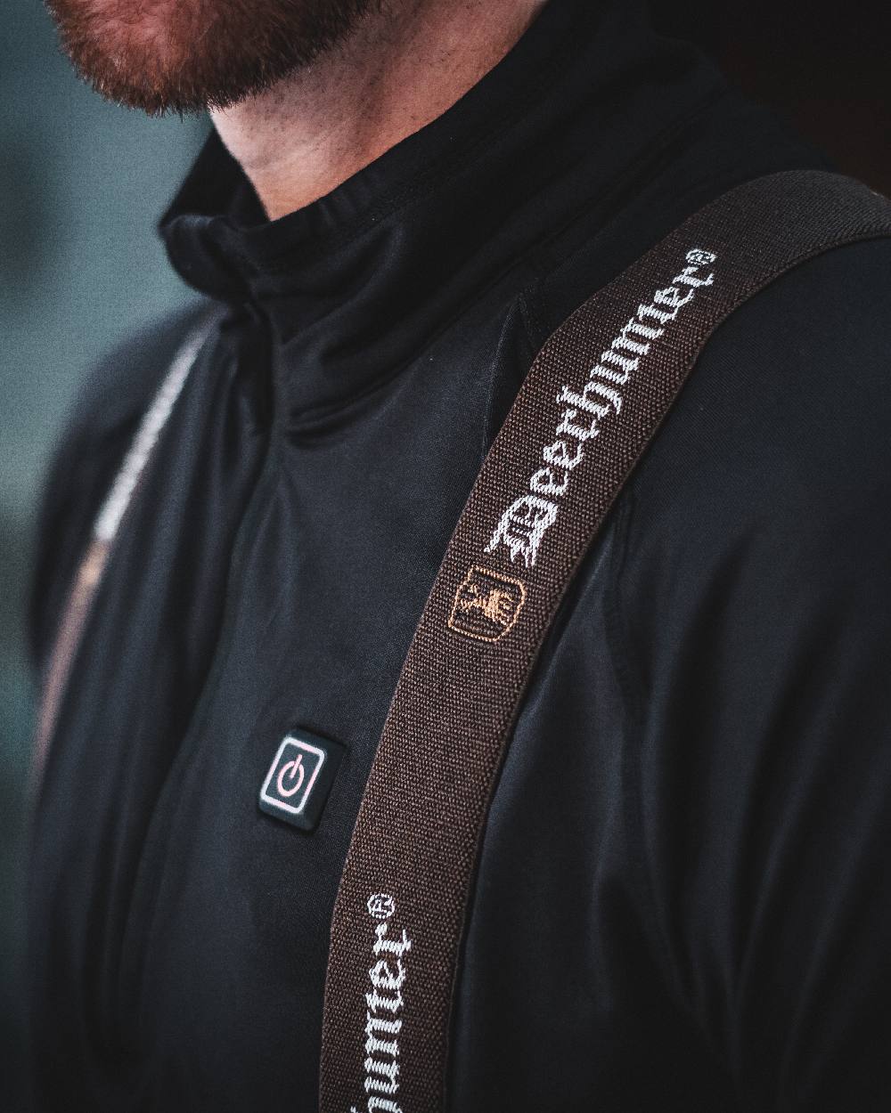 Black coloured Deerhunter Heat Undershirt with Zip Neck on blurry background 