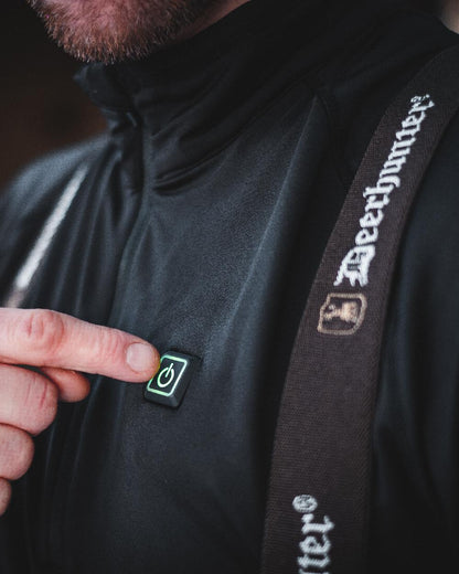 Black coloured Deerhunter Heat Undershirt with Zip Neck on blurry background 