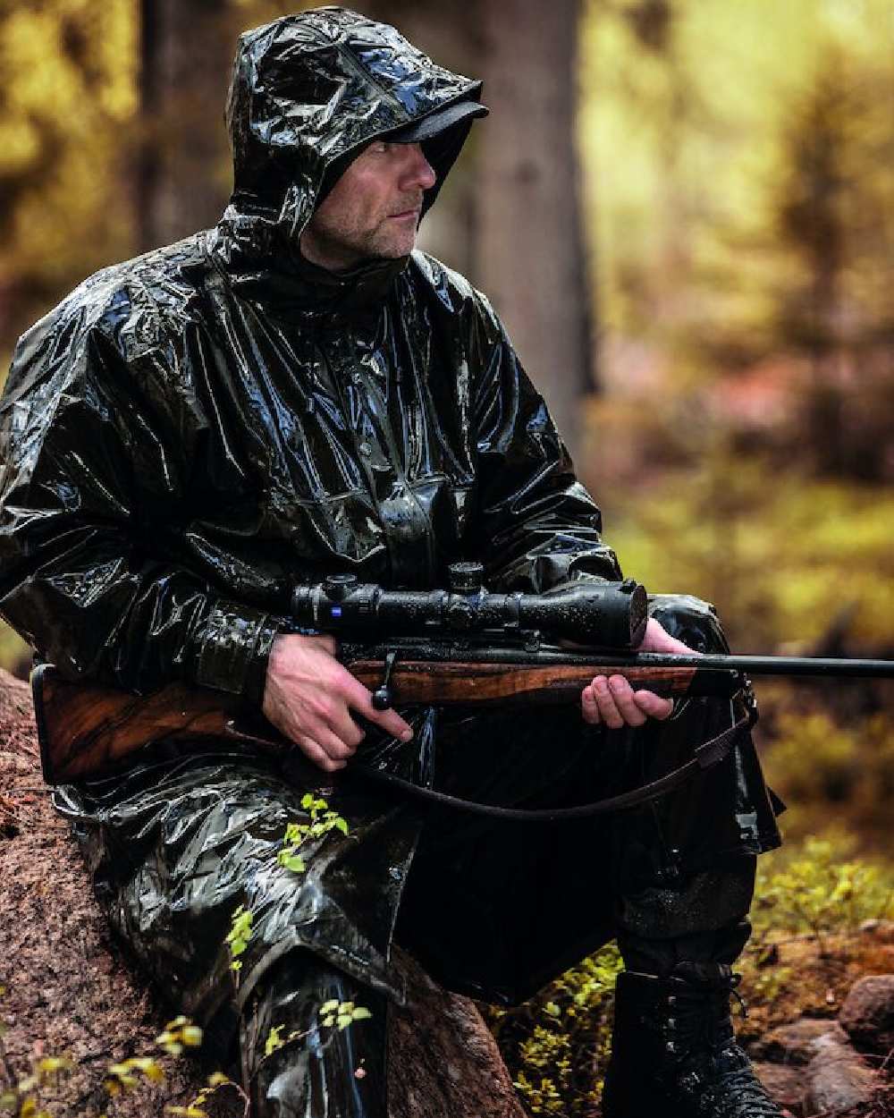 Art Green Coloured Deerhunter Hurricane Long Rain Coat on forest background 