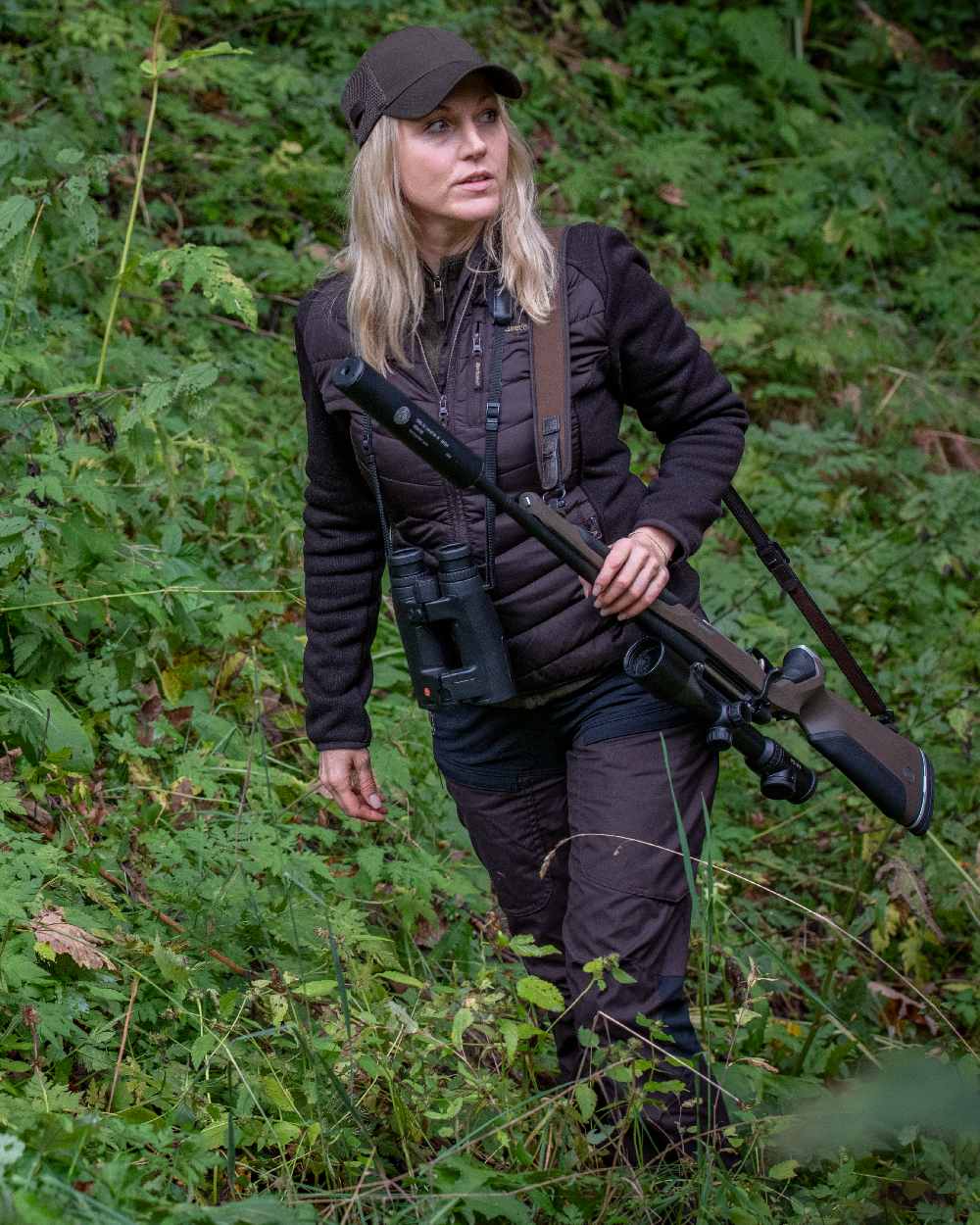 Dark Prune coloured Deerhunter Lady Ann Trousers on forest background 