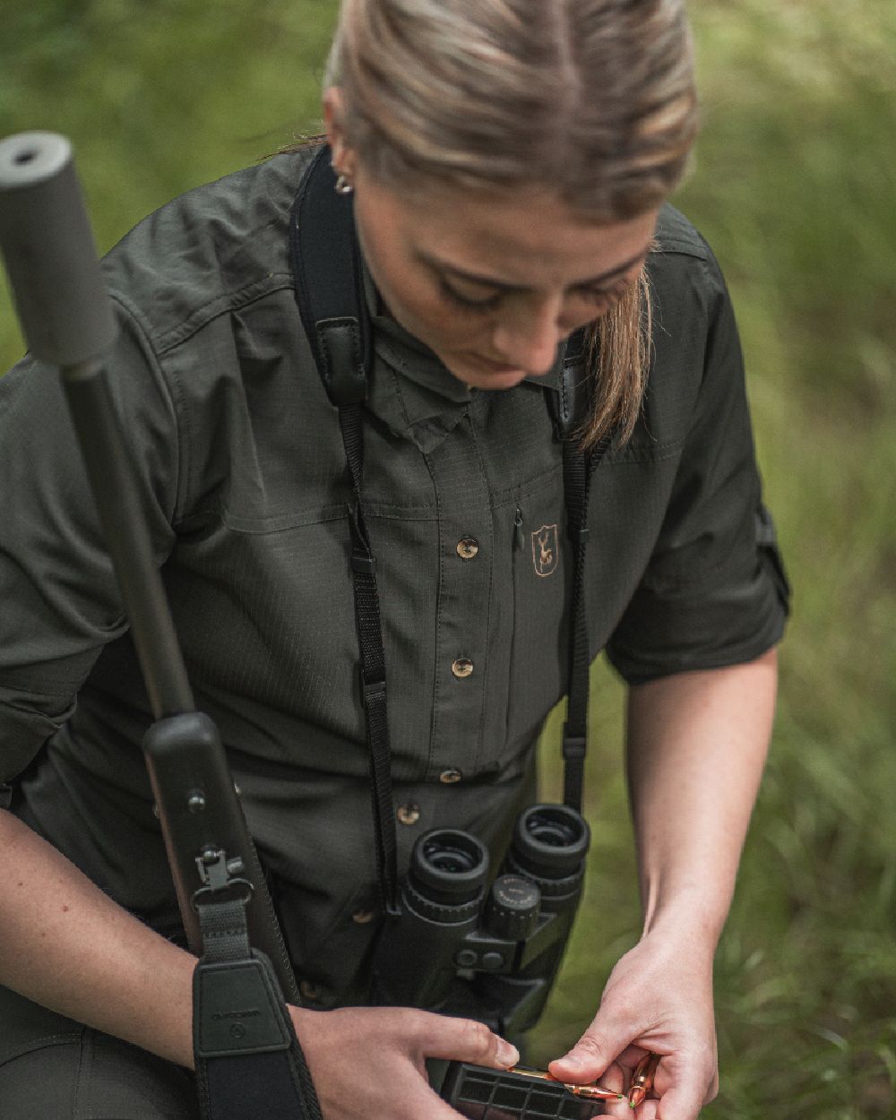 Forest Green coloured Deerhunter Lady Canopy Shirt on blurry background 