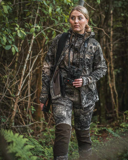 Realtree Excape coloured Deerhunter Lady Excape Softshell Jacket on forest background 