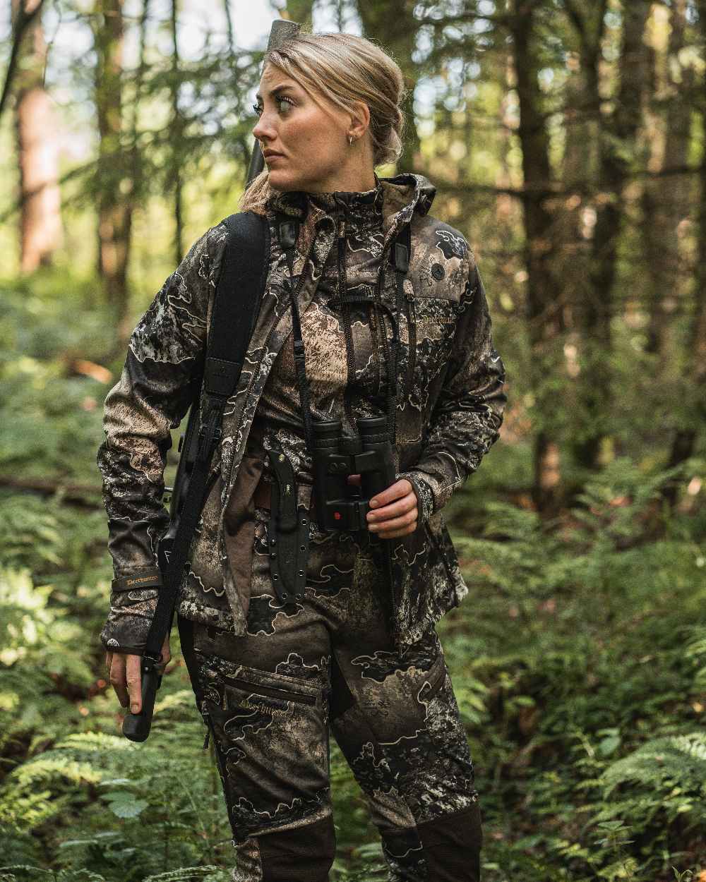 Realtree Excape coloured Deerhunter Lady Excape Softshell Jacket on forest background 