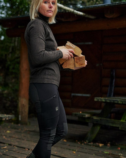 Black coloured Deerhunter Lady Reinforced Tights on blurry background 