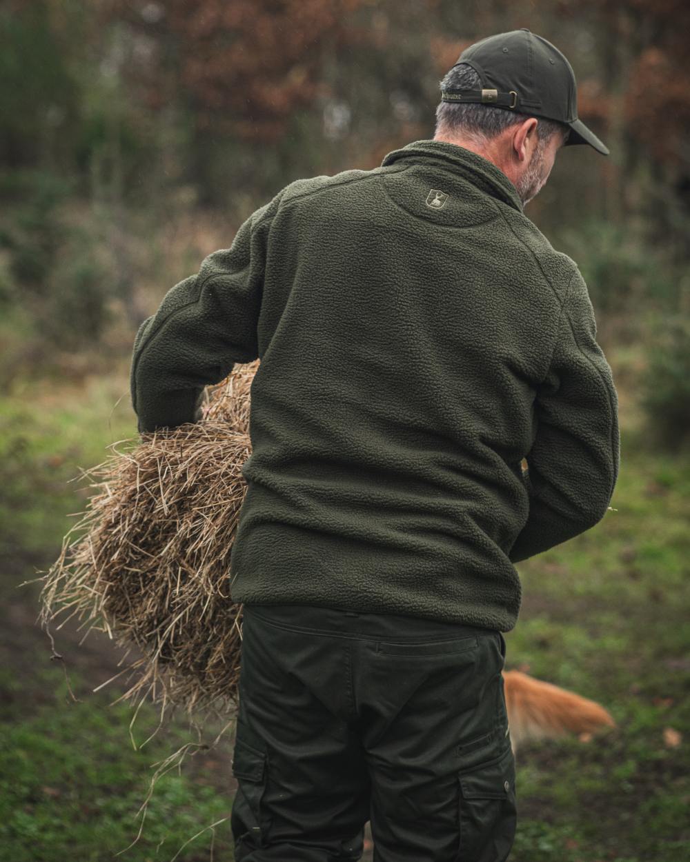 Forest Green coloured Deerhunter Atlas Fleece Jacket on forest background 