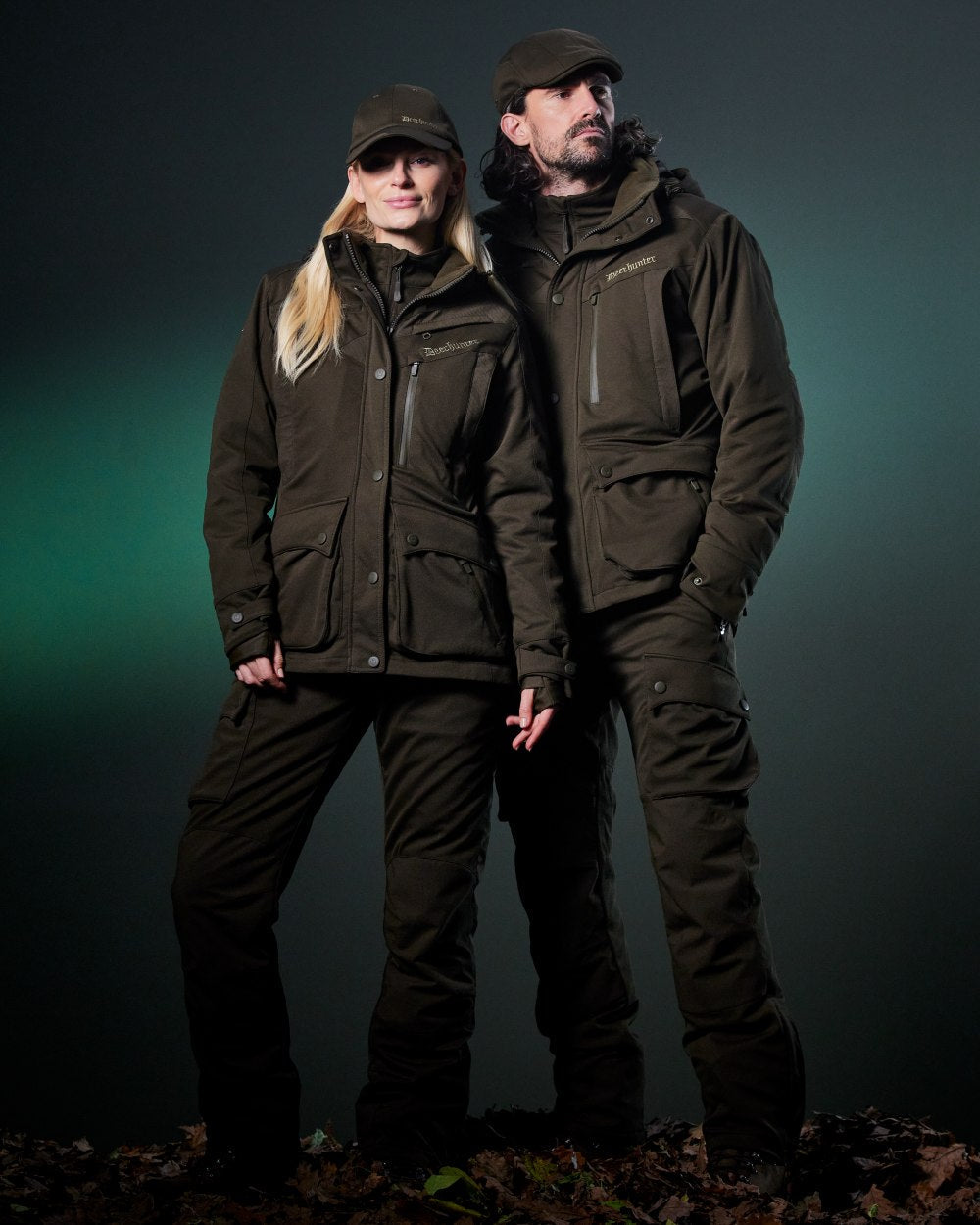 Art Green coloured Deerhunter Mens Muflon Pro Jacket on forest background 