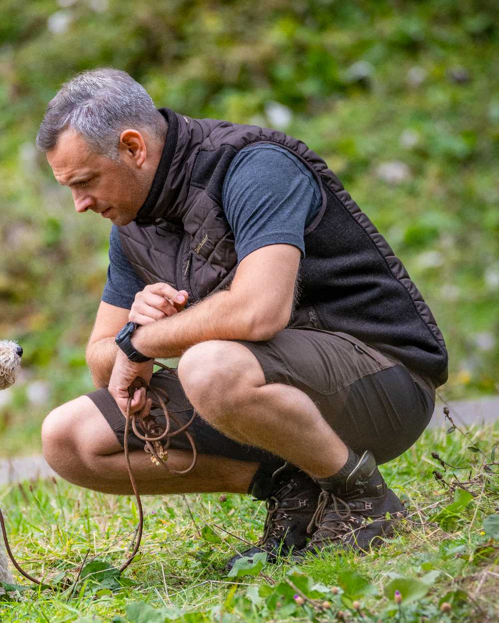 Bark Green coloured Deerhunter Northward Shorts on grass background 