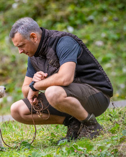 Bark Green coloured Deerhunter Northward Shorts on grass background 