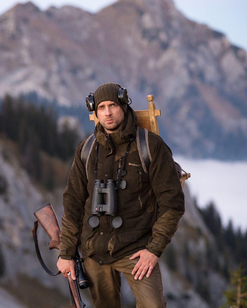 Beluga coloured Deerhunter Recon Knitted Beanie on blurry mountain background 