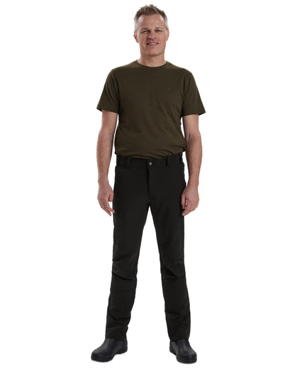 Black coloured Deerhunter Strike Full Stretch Trousers on white background 