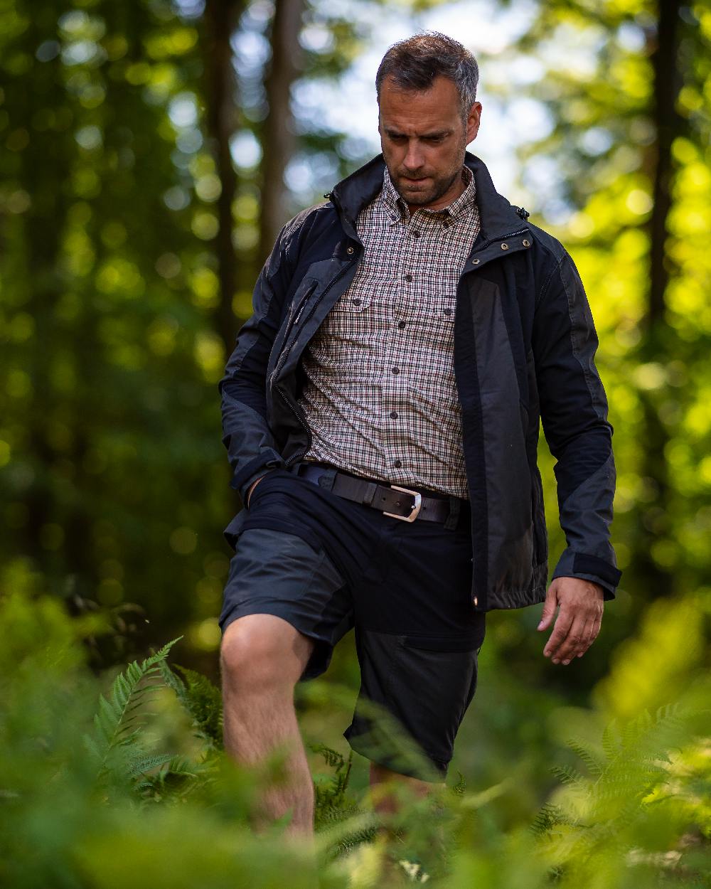 Black Ink coloured Deerhunter Strike Shorts on forest background 