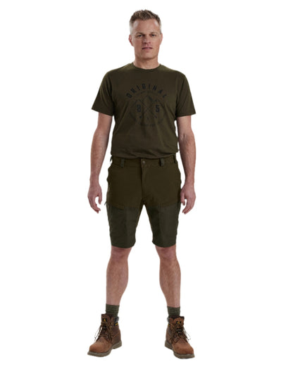 Deep Green coloured Deerhunter Strike Shorts on white background 