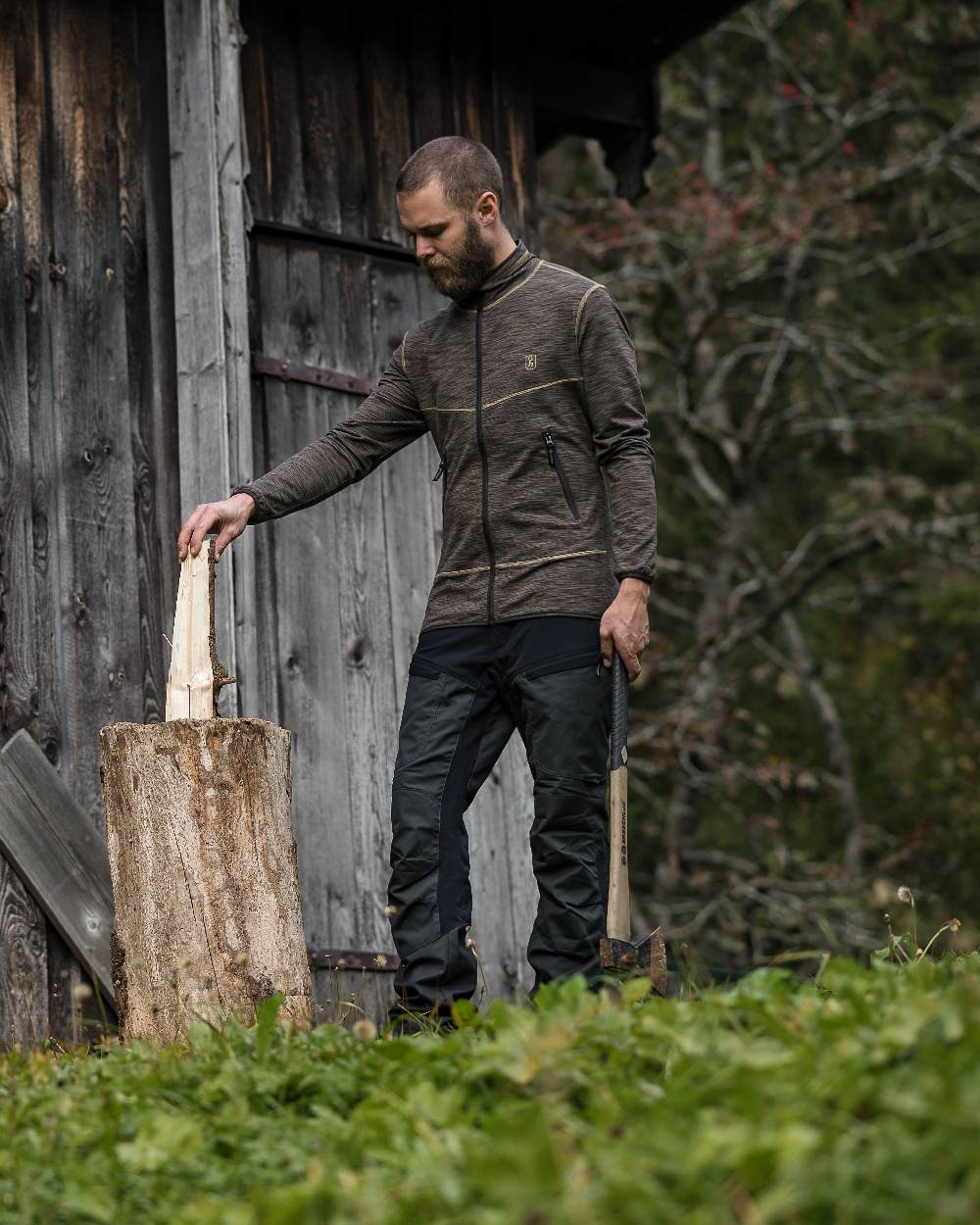 Black Ink coloured Deerhunter Strike Trousers on forest background