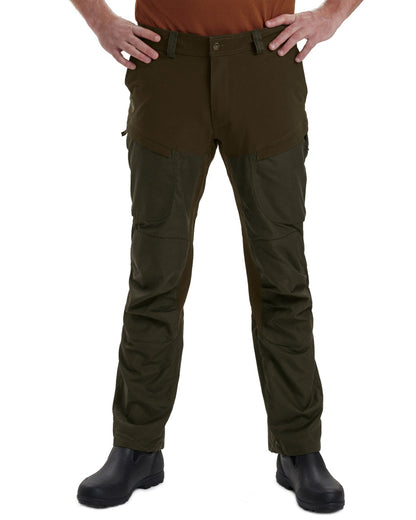 Deep Green coloured Deerhunter Strike Trousers on white background 