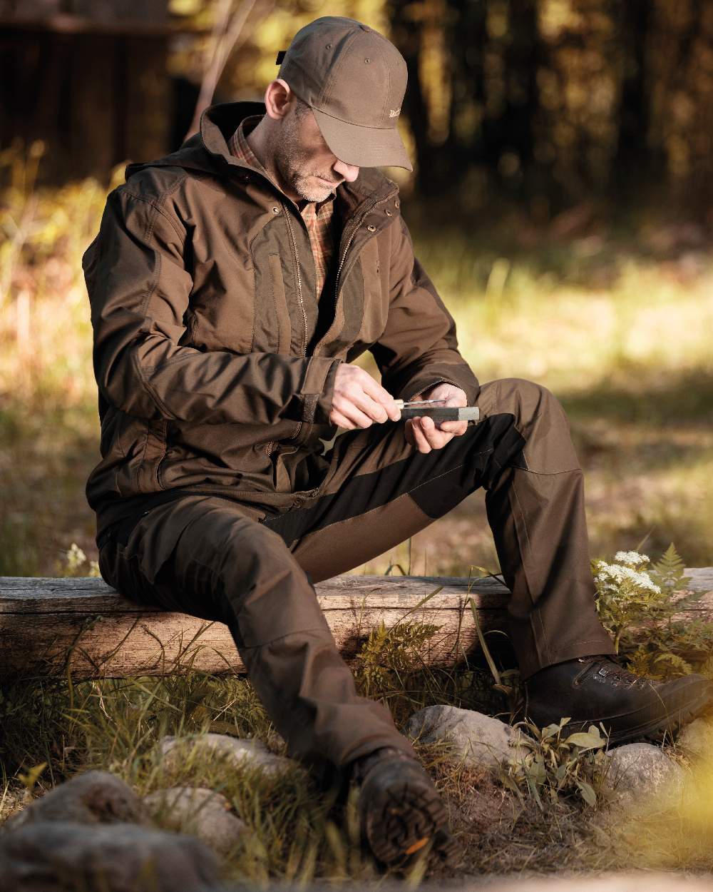 Fallen Leaf coloured Deerhunter Strike Trousers on forest background 