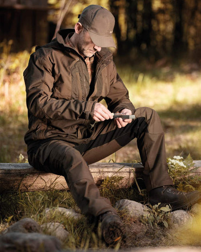 Fallen Leaf coloured Deerhunter Strike Trousers on forest background 