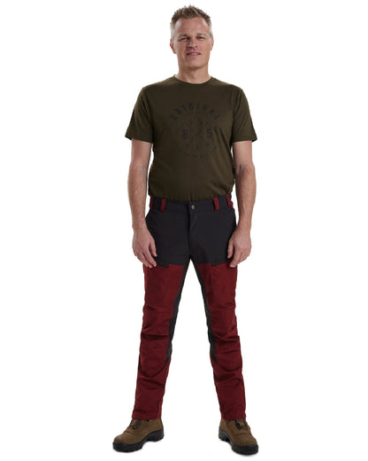 Oxblood Red coloured Deerhunter Strike Trousers on white background 