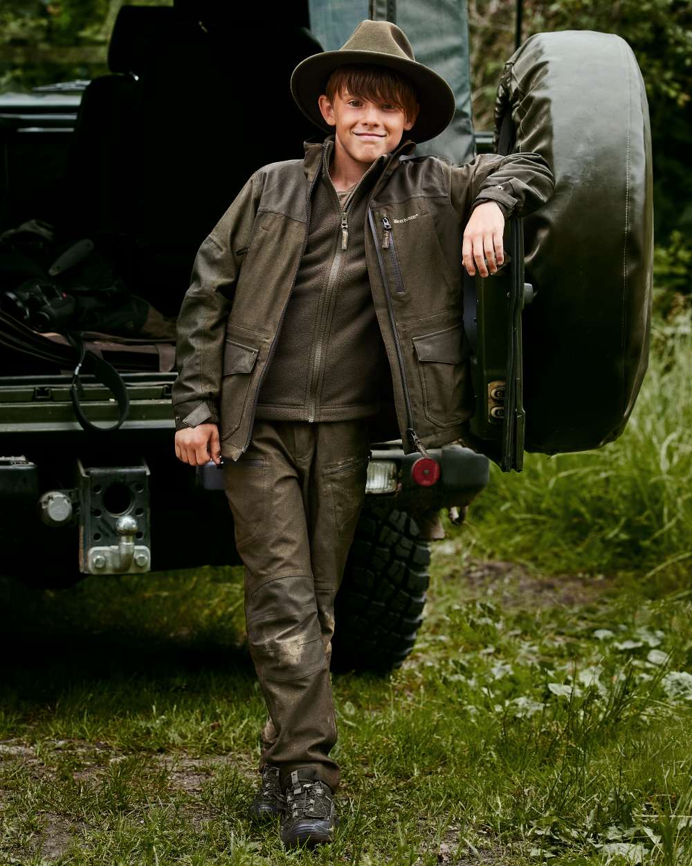 Beluga coloured Deerhunter Youth Chasse Fleece Jacket on forest background