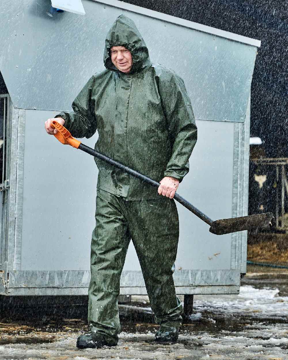 Olive Coloured Elka Light Jacket on construction background 