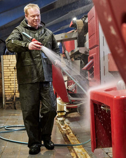 Olive Coloured Elka Mens Bib &amp; Brace on construction background 