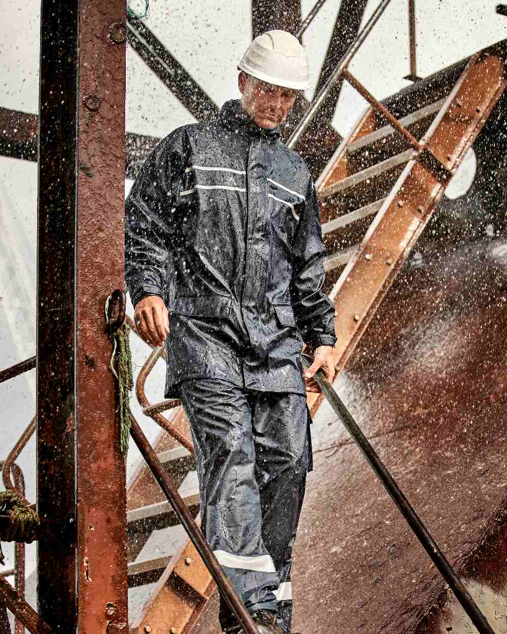Navy Coloured Elka Mens Dry Zone D-Lux PU Long Rain Jacket on stairs background 