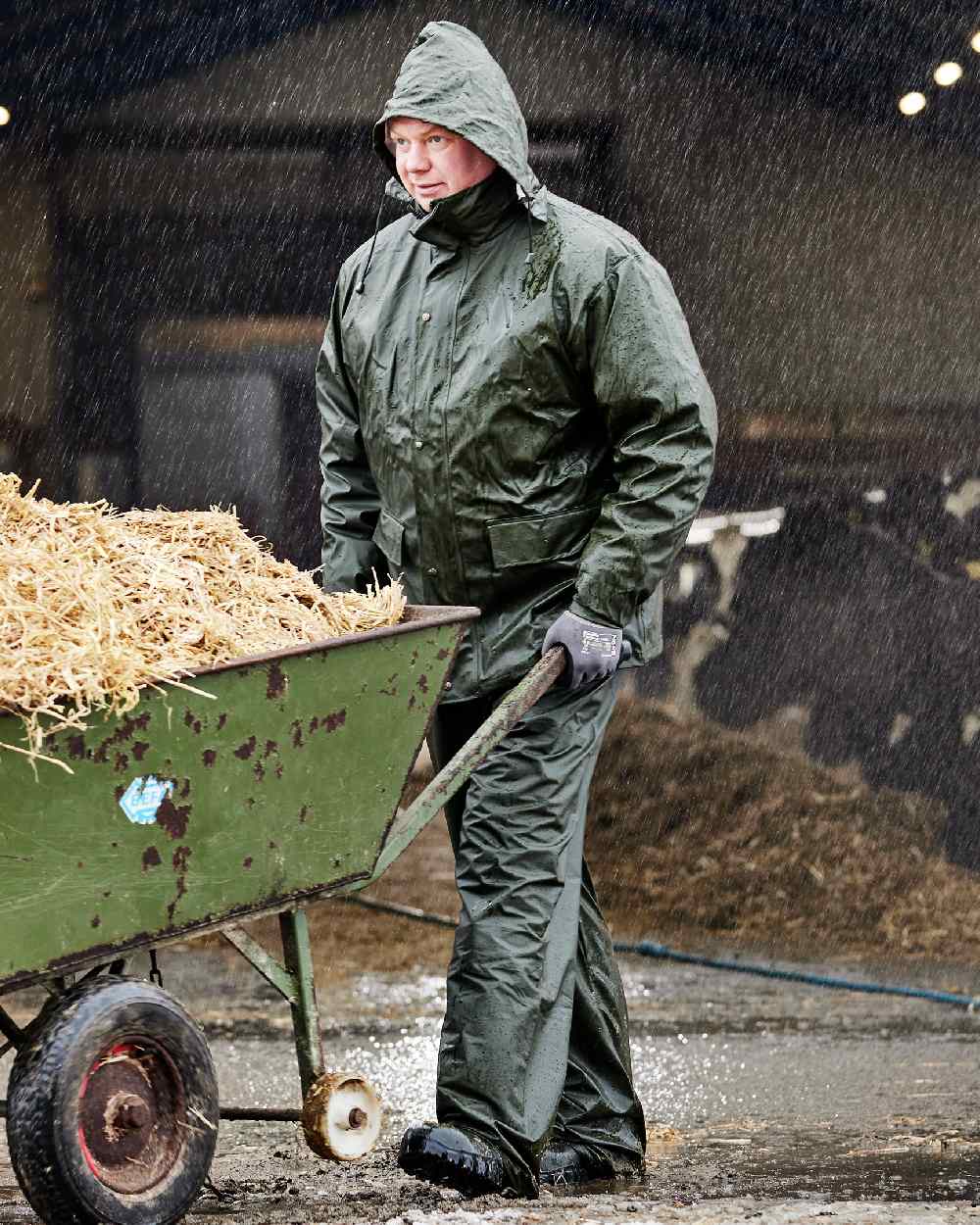 Olive Coloured Elka Mens Dry Zone PU Rain Trousers on rain background 