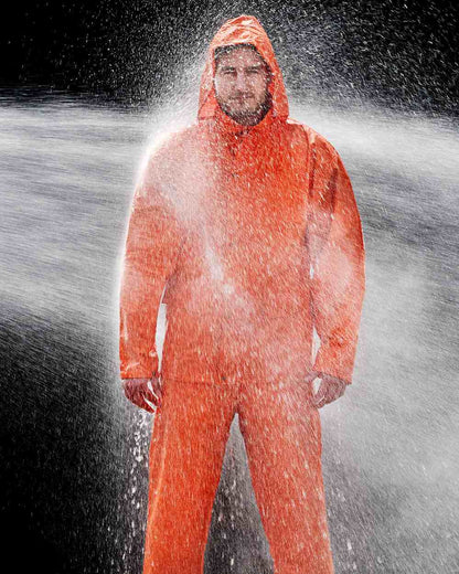 Orange Coloured Elka Mens Dry Zone PU Rain Trousers on water background 