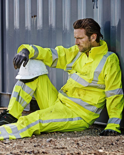 Fluorescent Yellow Coloured Elka Mens Dry Zone Visible PU Rain Jacket Hi-Vis With Reflective Stripes on outdoor background 
