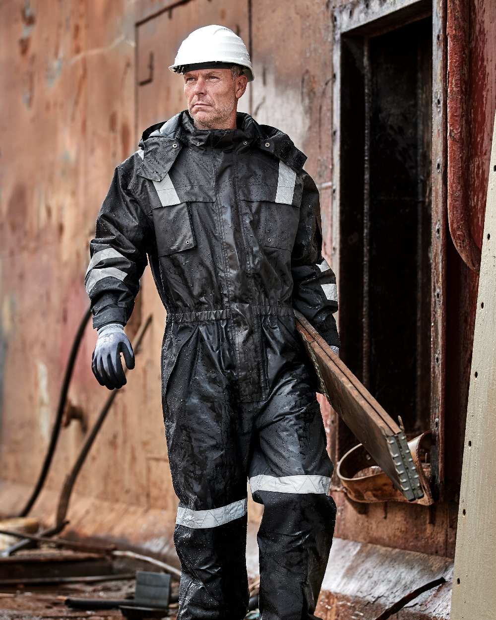 Grey Black Coloured Elka Mens Working Xtreme Winter Thermal Coverall on container background 